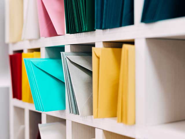 scalar enterprises blog categories image of sorted colour envelopes.